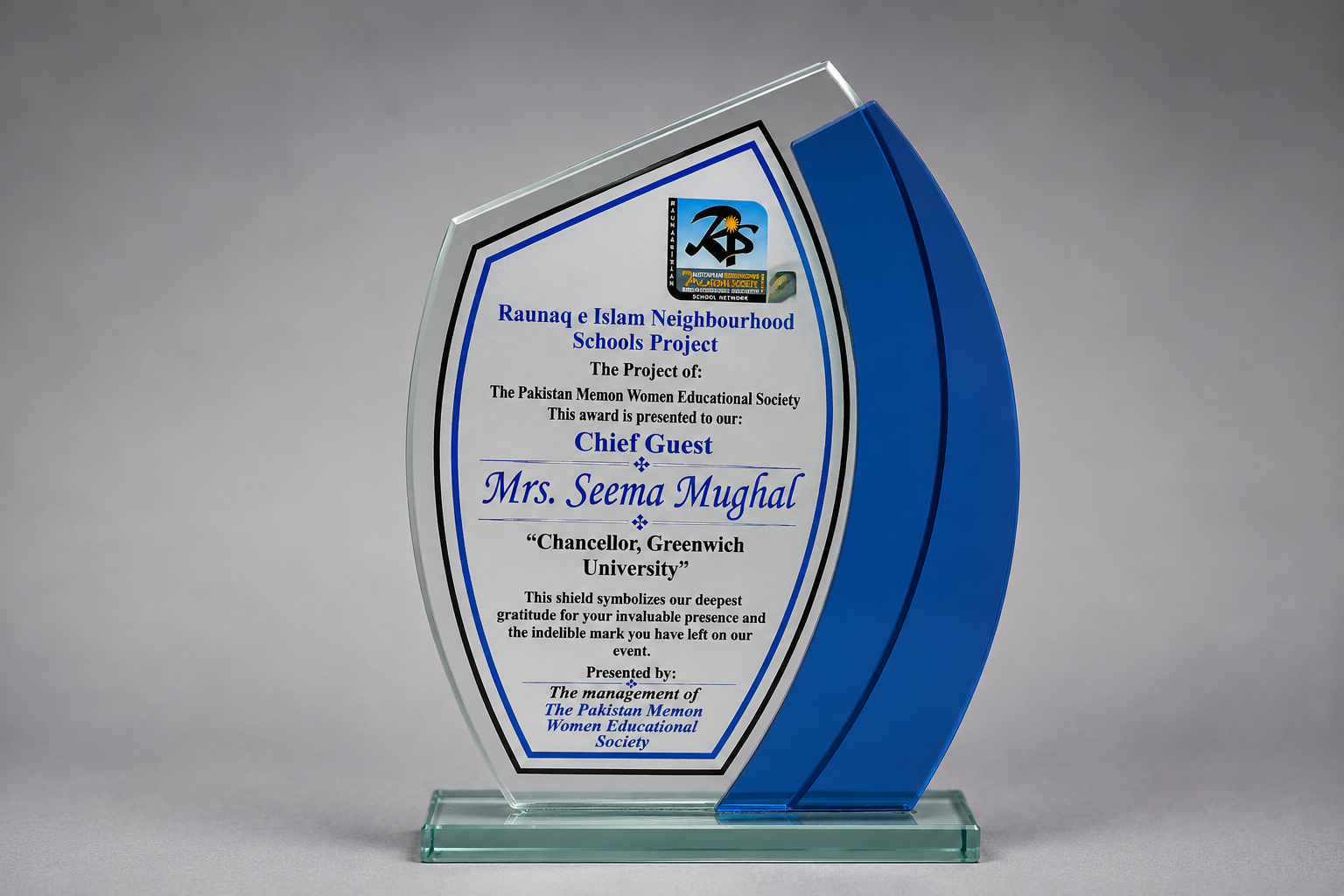 Raunaq-e-Islam Neighbourhood Schools chief guest shield for Mrs. Seema Mughal